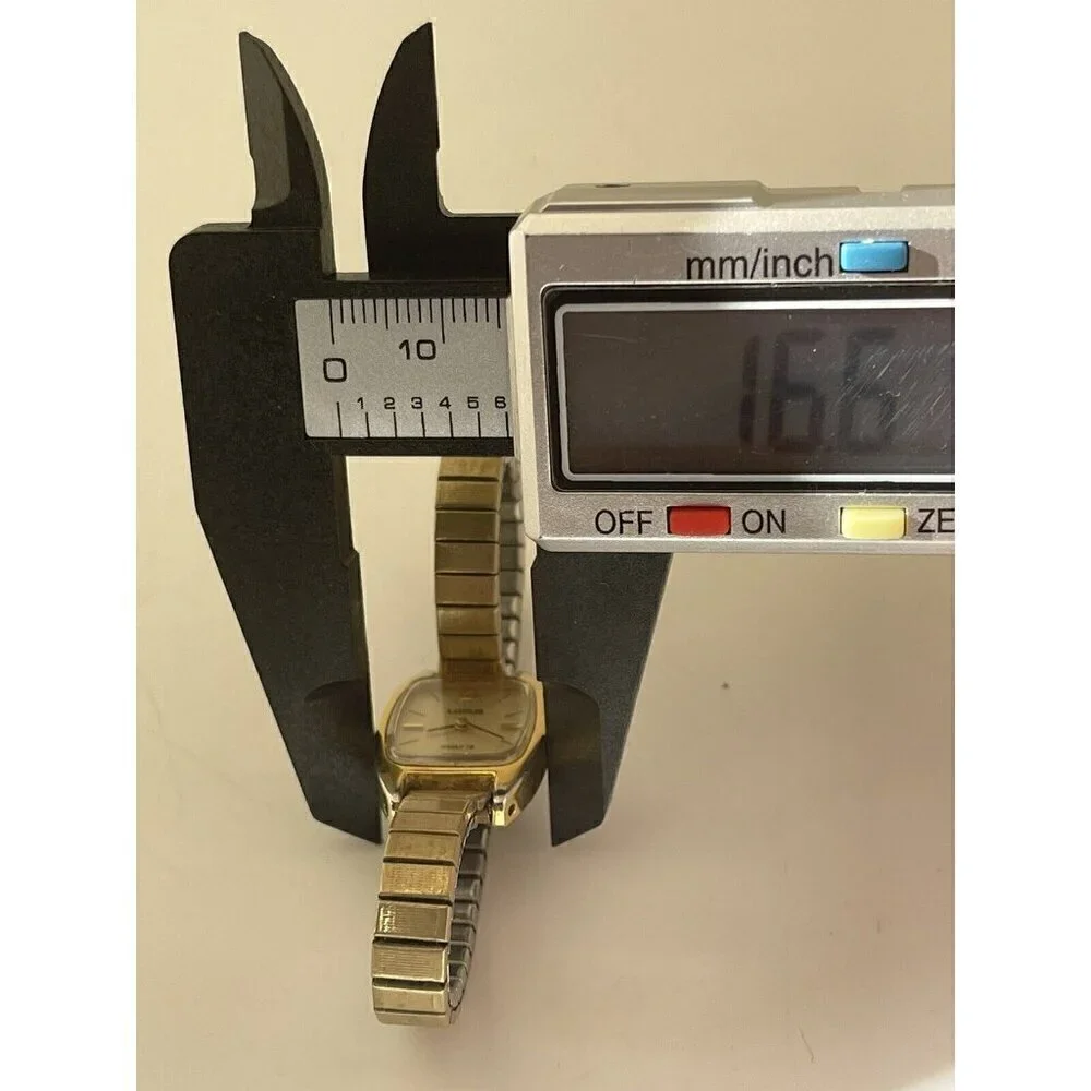 Vintage Lorus Quartz Women's Watch V235-5060 RO Gold Tone Stretch Band USA Made